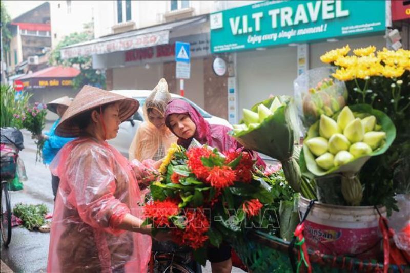têt doan ngo, kauf von blumen für den gottesdienst