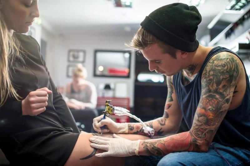 die Erfahrung bei Saigón Ink erleben